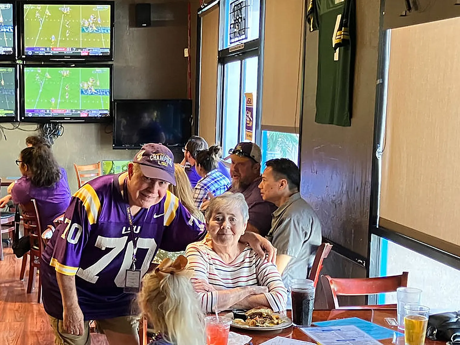 LSU fans at the table at Roundin' 3rd in Upland